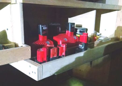 There is a charging station just above the mechanic’s box in the previous photo. The chargers are “live” and charging whenever the trailer’s plugged in.