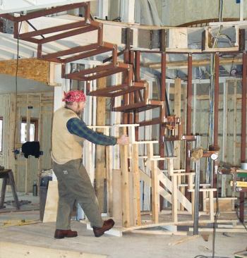 Once all the pieces are connected together, the stage is removed and the welds are completed.