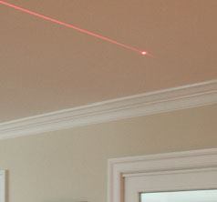 It also projects points up and down, so it can be used in place of a plumb bob.