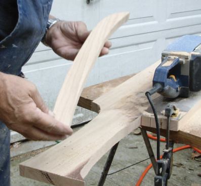Pattern-Rout the Edge: I want this edge to be as smooth, flat, and perpendicular as possible, since it will guide the 1/2-inch-radius round over bit I use to bullnose the edge of the return. For now I set the return aside to work on the tread.