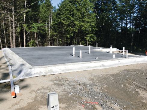 Because it is also the finished floor, the slab was meticulously power-troweled smooth and flat.