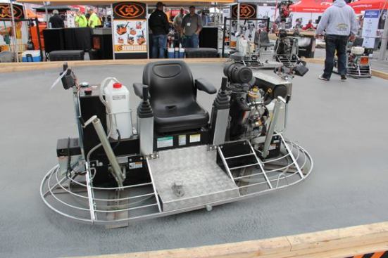A ride-on power trowel—as these things go this one is pretty small. I'll have to make a point of riding one at next year's show. 
Click here for video of a power-trowel obstacle course race.