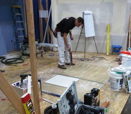 Myron Ferguson demonstrates the application of acoustical soundproof sealant at one of the many drywall clinics he performed at the show. His clinics are popular, because even if contractors want to sub out all of their drywall work, there will be times when they have to do the work in-house.