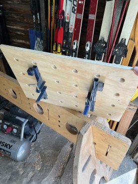 The miter saw table can also be secured to the rail with Trojan Work Center clamps.