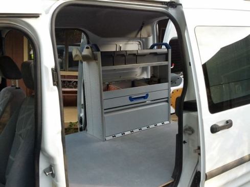 The transit came with a Sortimo shelving unit already installed and if set up right it had the potential to be a "lean mean carpentry machine”.