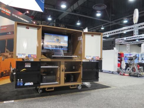 The big monitor makes this look like a jobsite entertainment system, but it's actually Knaack's 
DataVault Mobile Digital Plan Station. It's a secure lockable field station that includes a 40-inch monitor, color printer, backup power supply, 4 port USB hub, 2 port USB switch, and a 
Power Crew power supply.