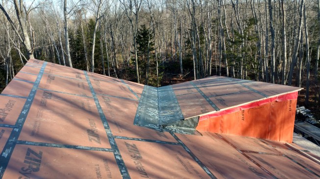 The 16-inch I-joist rafter cavities would later be filled with dense-blown cellulose insulation.