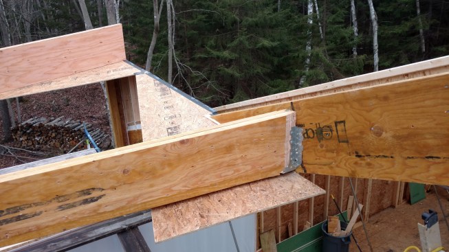 The valley rafter, downsized to a 12-inch height to allow for insulation above it.