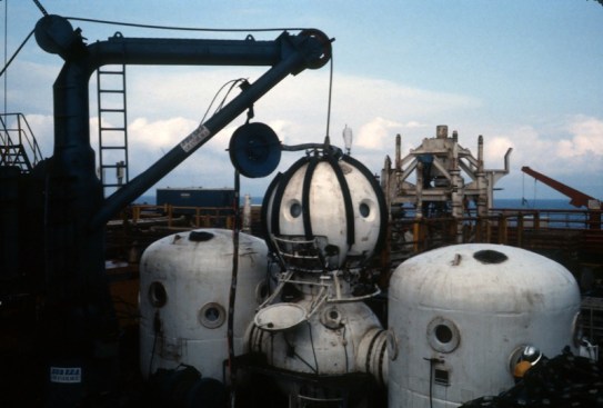 Shown here is a "saturation  diving system"  - a pressurized chamber used to acclimate divers to extreme deep sea pressures - like the one Bill and his coworkers lived in when working in the North Sea. The “diving bell” on top would get craned into the water and they would descend, two people at a time, to the job site, some 400 to 600 ft. below the surface. (Photo courtesy Gary Kane)