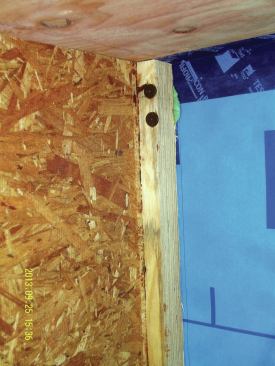 The 6-inch-long HeadLok screws used to attach the I-joists would penetrate the air barrier, so the screw holes were pre-drilled in each joist while it was on the ground, and filled with Pro Clima’s permanently flexible caulk, Contega HF (OR-F). The screws cinched the joist tight to the DB+ and the caulking was compressed for a good seal.