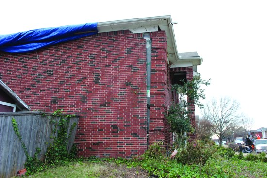 Failure of brick veneer exposed to relatively moderate wind speeds was common on the fringes of the tornado’s track.