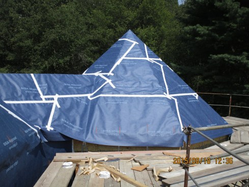 The crew applied Siga Majcoat air-tight membrane to the entire roof, including the octagon turret roof, and sealed all the joints with Siga Wigluv tape.