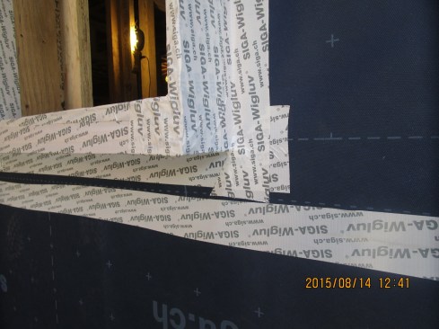 A closer look at the Siga Wigluv tape air-sealing detail around the window buck.