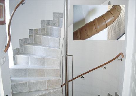 A spiral leather wrapping, secured with intermittent dabs of contact cement, provides a striking textured surface (inset). While unusual, that treatment does have a local antecedent: Architect Alvar Aalto used a similar approach on the linear brass railings in a well-known Helsinki concert hall.