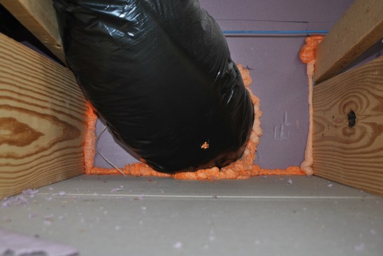 They seal the foam board to the framing with gun foam, sealing ductpenetrations at the same time.