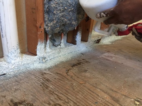 Using a hand-held hopper and gun, we are able to move quickly, covering nail plates, copper pipes, and the framing plates with a flexible seal in about 30 seconds.