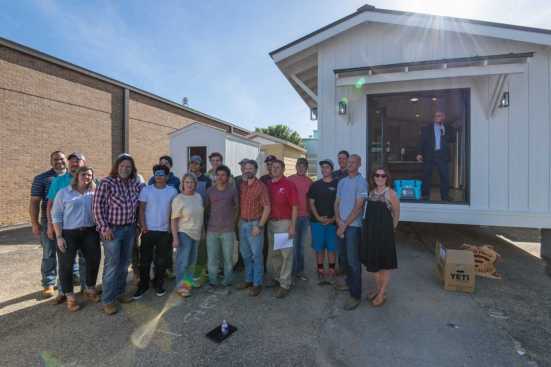 Richard Laughlin (fourth from left) with the many partners that make Casa Über Alles possible.