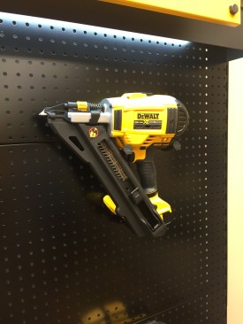The cordless positive placement metal connector nailer was on display and being demonstrated (DCN693M1). It can handle 1 1/2" and 2 1/2" fasteners and has sequential and rapid fire modes. It runs on a 20V Max battery. The kit comes with a charger and one 4Ah battery. It's available now and costs $449.