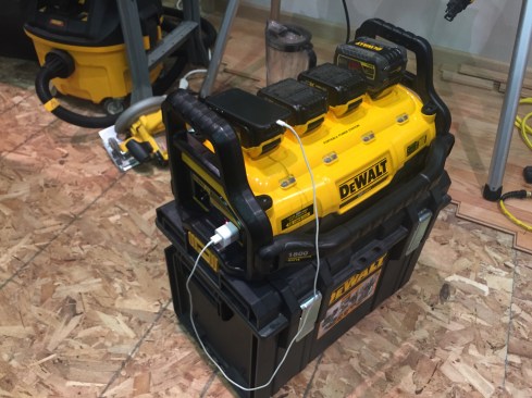 There's a lot going on here. This is DeWalt's new 1800 Watt portable power station (DCB1800) clipped ontop of a tough box. The power station serves as a charging station for 20V Max and 60V Max batteries. To charge your batteries you'll need to power the station with an extension cord because it doesn't have a cord. It doesn't have a cord because it also serves as portable power. Yes, it's charging an iPhone in the picture, but that single outlet will also run a power tool. Run times vary depending upon batteries (the lowest Ah battery sets the power pack's fuel allotment). Cost: $399 for the bare tool; (DCB1800B) and $599 for a kit (DCB1800M3T1; three 20V Max DCB204 batteries and one 60V Max FlexFuel DCB606). Needs 4 batteries to have AC power.