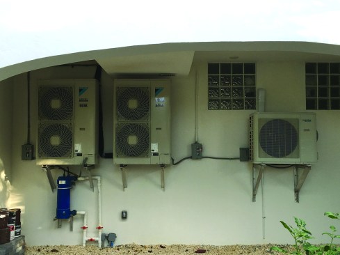 It gets its heat from waste heat recovered using a condenser spliced into the air
conditioning system’s refrigerant line.