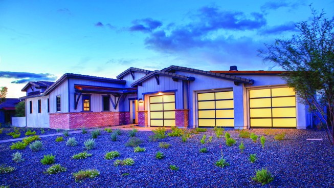 Mandalay Homes installs LED downlights over garage doors, rather than traditional carriage lights flanking the doors. This helps comply with “dark sky” regulations, creates a pleasing light, and conserves energy.