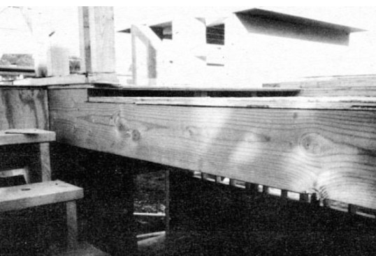Ripping long notches in floor joists, such as to make room for grouted entry  floors, weakens the joists unacceptably and violates all codes. Instead, you need to use  smaller dimension milled lumber of a higher grade or set closer together. If necessary,  you can fur at the ends to bring non-grouted areas up to level.