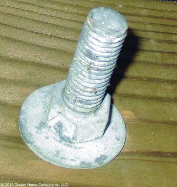 The white rust on this ledger bolt indicates that it is still safe but is nearing the end of its service life.