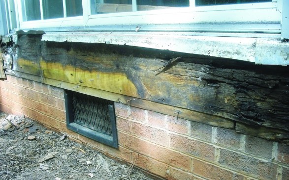 The sheathing and band joists on these homes are in rough shape, thanks to moisture intrusion from their decks.