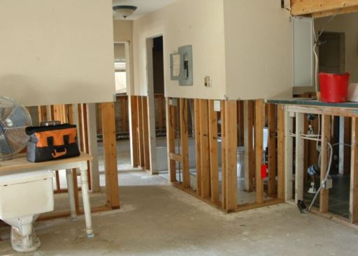 After a flood, you can do this to help save a home. But you could also minimize this sort of work by using insulation and finish materials that can tolerate wetting and allow the assembly to dry without extensive demolition. (Photo by Michael Springer)