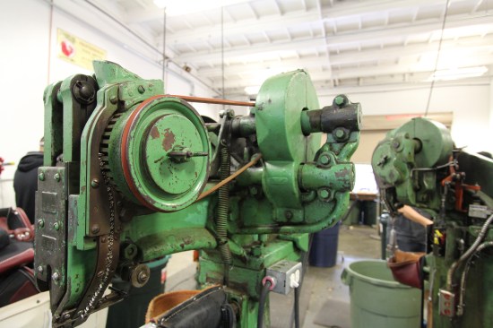 I included a photo of this riveting machine because the original drive belt has been replaced with one made from leather—which seems appropriate in a shop where leather goods are produced.