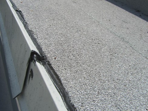 Metal drip edge moves almost 3/8 inch in 10 feet as temperatures change between summer and winter—too much to effectively seal. The large gap shown here illustrates how far this kind of joint can open up