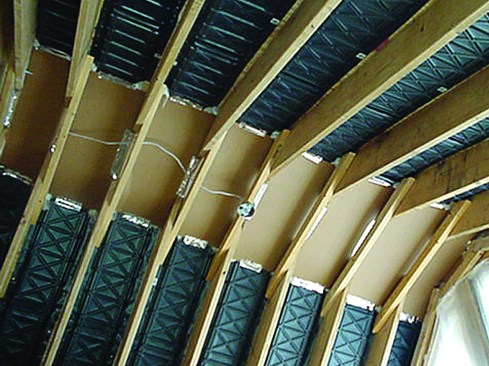 2. Vented cavity. An inexpensive option shown above is to vent a cathedralized
space using continuous vent chutes spanning the entire length from soffit inlets to ridge outlet.