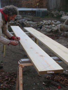 To transfer the layout onto the mating stringer I square a line where each of the riser/tread marks meet along the top edge of the pattern stringer.