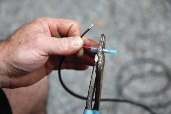 To make weatherproof electrical connections, the author starts by joining marine-quality cable with heat-shrink butt connectors. 