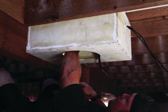 To keep the woofer dry, the author built a waterproof enclosure for it with Nylosheet, a waterproof material made of fiberglass and 

recyled carpet (nyloboard.com).
