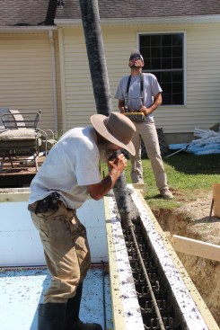 When the day came to pour the slab and walls, I did have a helper, and I was glad for it. We went around the walls in two lifts.