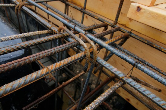 The rebar running through the beams interlocked with the slab reinforcingand with the pier reinforcing.