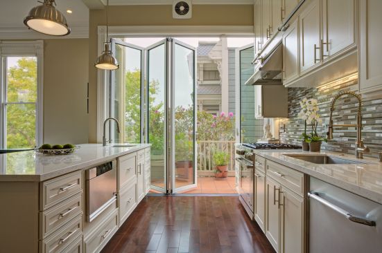 The new owners are gourmet home chefs and entertain regularly so a functional and spacious kitchen was on the top of their priority list. The once cramped galley-style kitchen now is an open area with room to prep and cook comfortably and accommodate guests in their central gathering space.