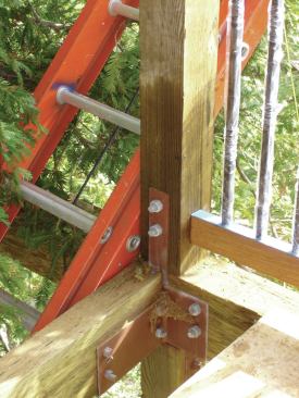 Custom-fabricated brackets attach the wood framing to the steel moment frame where required. 
