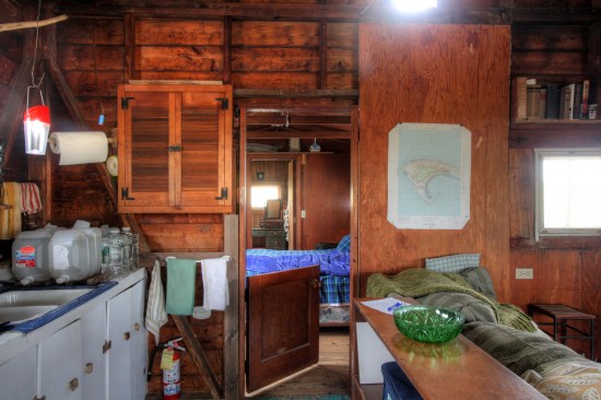 A raised panel door was sawn in half to create a Dutch-style door. Special hardware locks the top and bottom together.