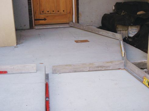 Straightedges and levels can offer a better read of a slab's surface than can a laser.