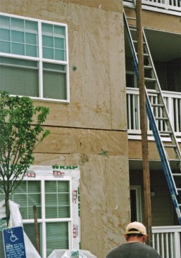 Inspections of multifamily housing in Oregon revealed water staining on gypsum sheathing beneath contact-applied vinyl siding.