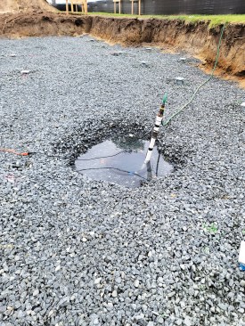 During the project, an existing sump pit (from a previous structure) was used to help manage the water level on the wet site.