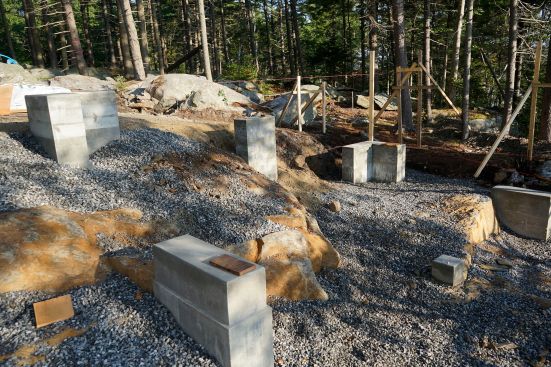 The crew places concrete and frames up stemwalls.