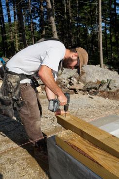 The crew places concrete and frames up stemwalls.