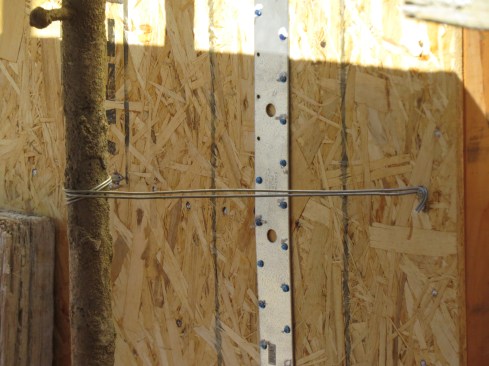 Multistory scaffolds require wire ties to secure them against toppling.
