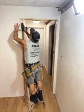 He followed the same careful process when installing the split header trim.