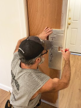 To accurately position the latch, the author first made a template to mark its location.
