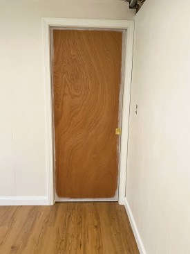 Ready for finish paint, the installed door may rarely be needed, but when a little privacy is desired, it will slide smoothly out of the wall to provide it.
