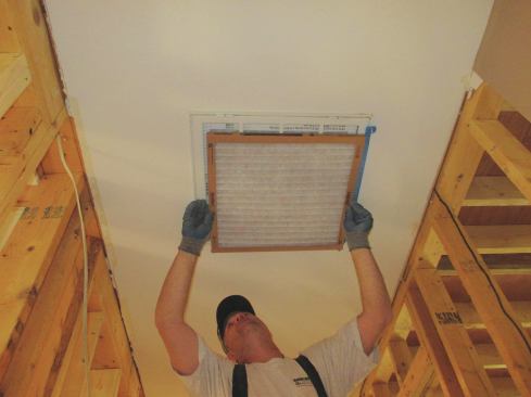 If the house has a forced-air system, I tape furnace filters over all the return ducts.